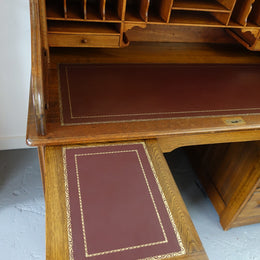 An Antique American Oak Cutler Roll Top Desk