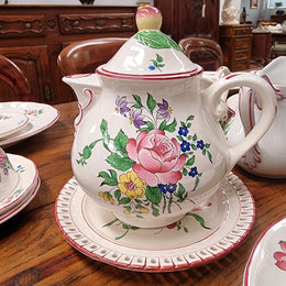 A pretty French table setting made in France called Luneville. It consists of plates, cups, saucers, tea pot, milk jug, sugar bowl, tureens and cake plates a total of 53 pieces. Please view photos as they help form part of the descriptions.