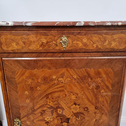 Elegant French transitional style Walnut & Kingwood Salon cabinet. It has beautiful marquetry inlay, a marble top and decorative ormolu mounts. Sourced From France and is in good original detailed condition.