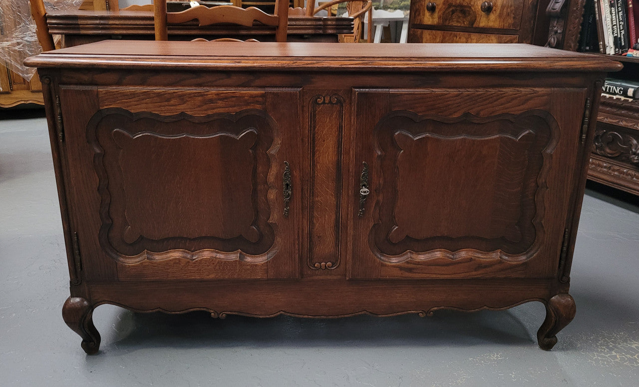A hard to find Louis XV style French two door cabinet which would make an ideal TV cabinet. It has been sourced from France and in good original detailed condition.