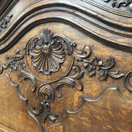 Antique French Oak Louis XV style mantle/trumeau mirror. It has its original mirror and is in good original detailed condition.