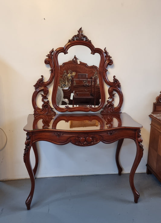 Walnut Parisian late 19th Century dressing table with mirror. Also has a glass top for protection, mirror moves and has drawers with key and working locks. In good original detailed condition.