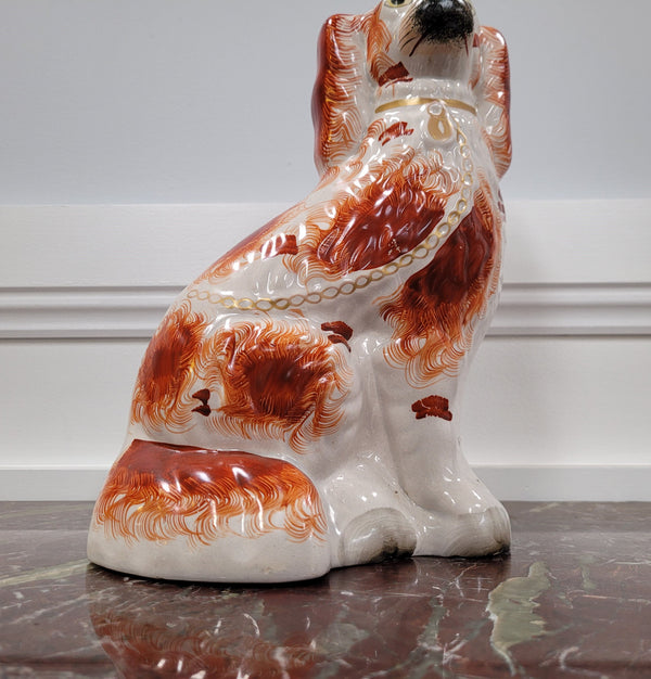 Antique Staffordshire dog statue. Please view photos as they help form part of the description.