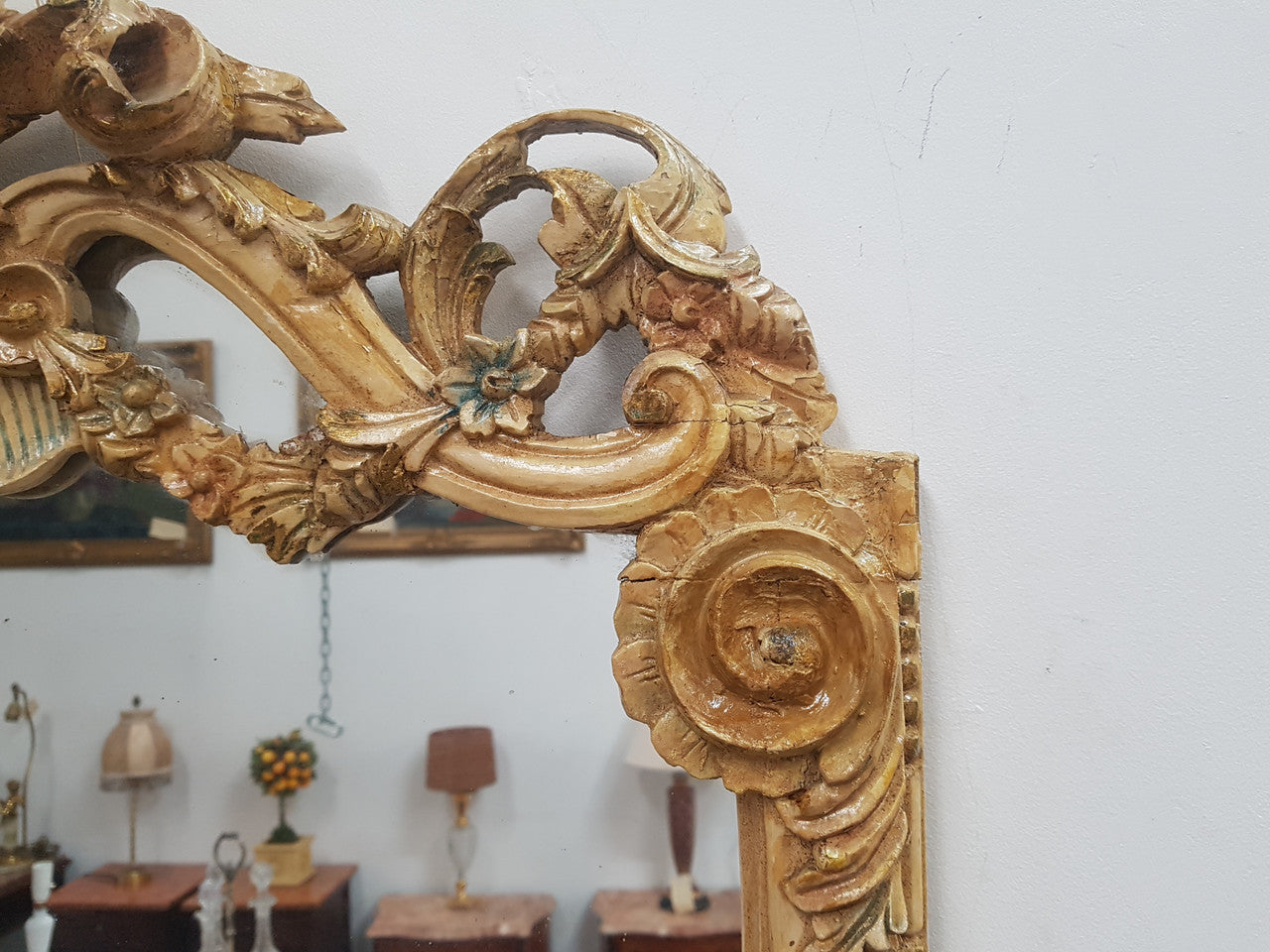 Beautifully carved Italian Rococo style painted console/hall table and mirror. An amazing coloured marble top showing sections of gold veins and is in good condition. Mantle mirror is retaining it's original mirror and showing ages spots.