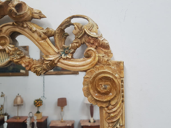 Beautifully carved Italian Rococo style painted console/hall table and mirror. An amazing coloured marble top showing sections of gold veins and is in good condition. Mantle mirror is retaining it's original mirror and showing ages spots.
