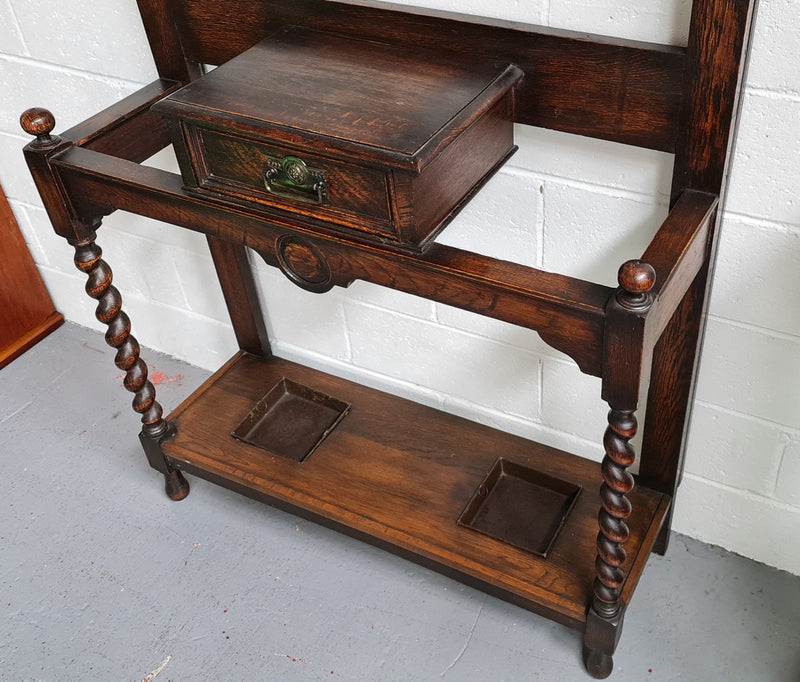 Beautiful Oak Antique Jacobean hall stand, with barley twist leg and a drawer for storage in very good original detailed condition condition.