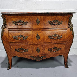 Attractive French marble top Louis XV style three drawer commode with decorative ormolu mounts. In good original detailed condition.