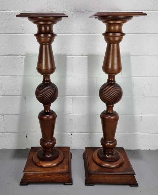 Pair of unique French Oak pedestals, beautifully constructed and turned with decorative carving. Circa 1880. In good original detailed condition.