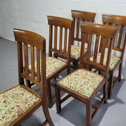 Five Blackwood dining chairs with upholstered seats. They are in good original condition including the upholstery.