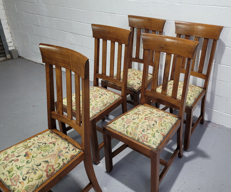 Five Blackwood dining chairs with upholstered seats. They are in good original condition including the upholstery.