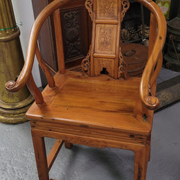 Lovely Chinese Elm horseshoe chair, featuring stunning carving and it is in good original detailed condition.