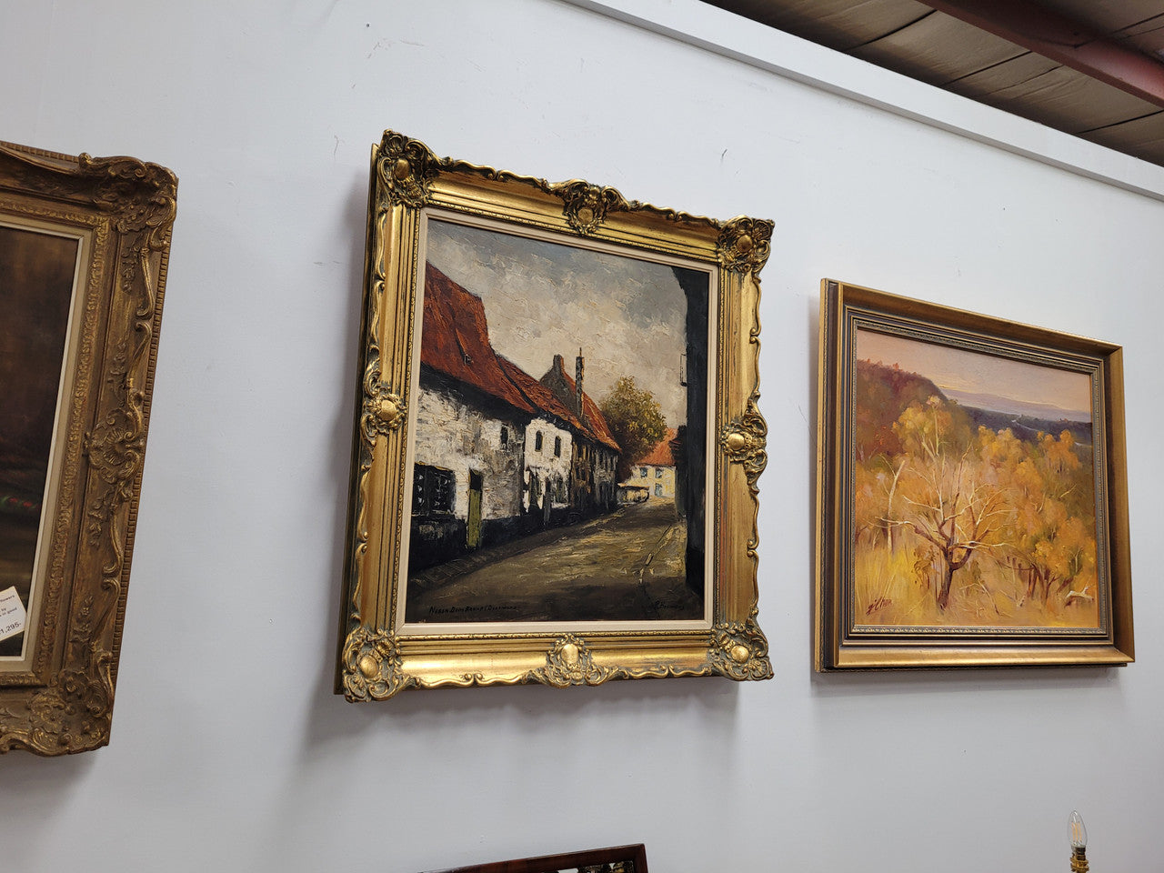 Dutch signed oil on canvas depicting village street in a beautiful gilt frame. It is in good original detailed condition and has been sourced from France.