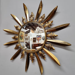 Stunning French Vintage gilt metal starburst convex mirror. It has been sourced from France and in good original detailed condition. Please note mirror does have some spotting due to age but only adds to its character.