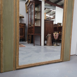 Superb French 19th Century trumeau mirror with original paint, gilt and oil on Canvas. Original mirror C:1880’s