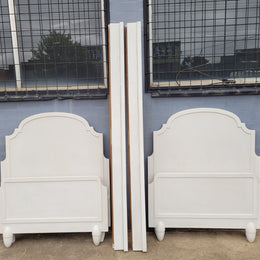 Two attractive vintage French chalk painted king single Art Deco beds. They have been sourced from France and are in good original condition.