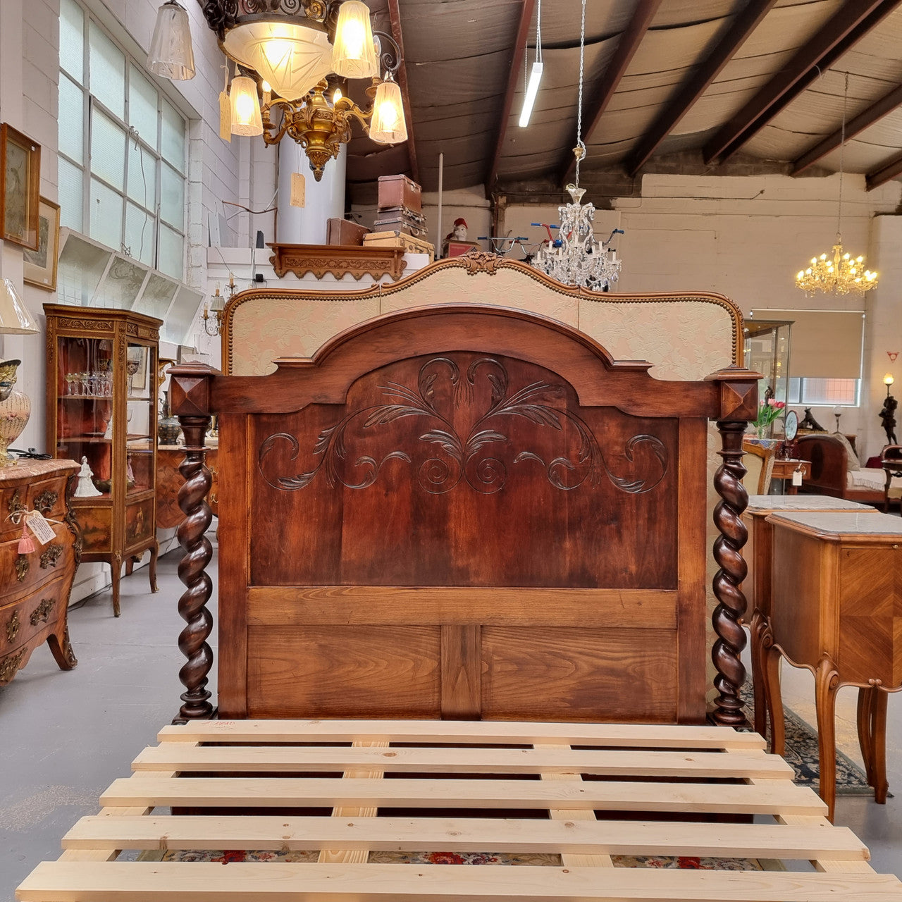 French 19th Century Walnut Henry II style queen sized bed with Barley Twist posts. Bed comes complete with custom made slats. Just place your mattress on top. In good original detailed condition.