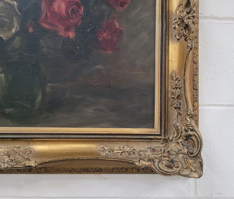 Beautiful gilt framed and signed oil on board depicting roses in floral arrangement. It is in good original detailed condition.