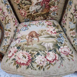 Pair of amazing French Walnut tapestry covered armchairs. The tapestry is in very good condition, please view photos as they form part of the description. Sourced from France and is in good original detailed condition.