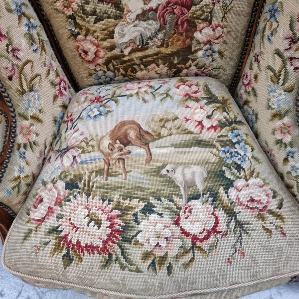 Pair of amazing French Walnut tapestry covered armchairs. The tapestry is in very good condition, please view photos as they form part of the description. Sourced from France and is in good original detailed condition.