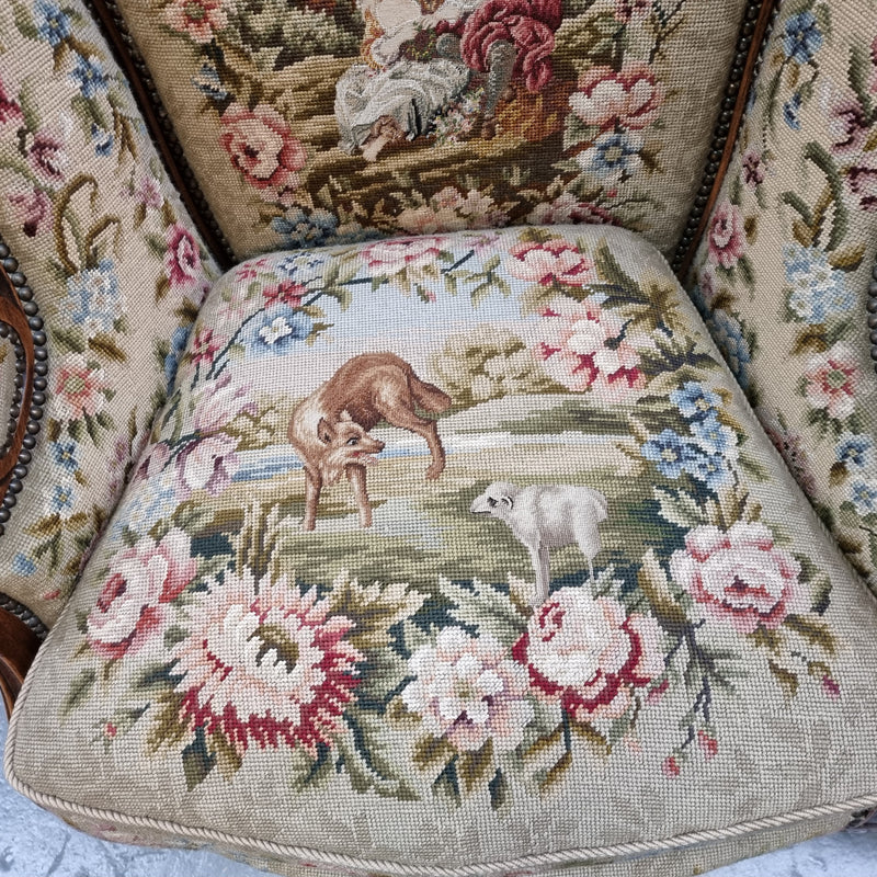 Pair of amazing French Walnut tapestry covered armchairs. The tapestry is in very good condition, please view photos as they form part of the description. Sourced from France and is in good original detailed condition.