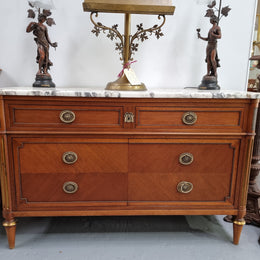 Louis XVI style Mahogany marble top cupboard. It has two drawers at the top and two doors at the bottom all with decorative handles and mounts. Stunning white marble top and all in good original detailed condition.