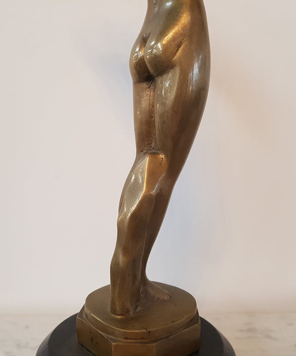 Here we have a lovely circa 1930's solid Art Deco bronze statue of a female on a wooden base. In good original condition.