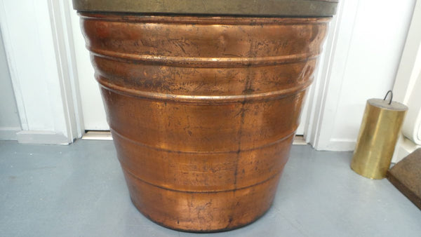 A fabulous French rustic antique copper and brass two handled bucket. Has loads of character and would make a great bucket for firewood. It is in very good original condition