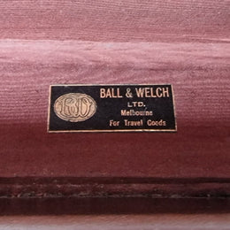 Impressive solid leather suitcase, moire fabric lined with leather straps to hold contents. Displays gold initials F.S.A near handle. With key. Please view photos as they help form part of the description.
