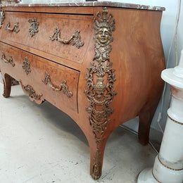 A large French Louis XV style Burr Walnut commode with a beautiful marble top. Has beautiful detailed mounts and plenty of storage space with two large drawers. From circa 1920 and in very good original condition.