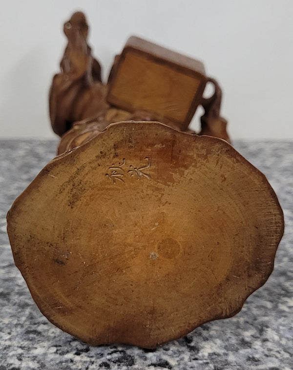 Exceptional Japanese Meiji period boxwood carving of a Peach Seller. Circa 1880's and it is signed to base. It is in good original condition, please view photos as they help form part of the description.