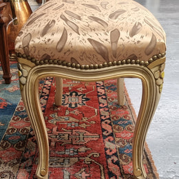 Appealing French Louis 15th style hand painted and gilded stool with good upholstery. In good original detailed condition.