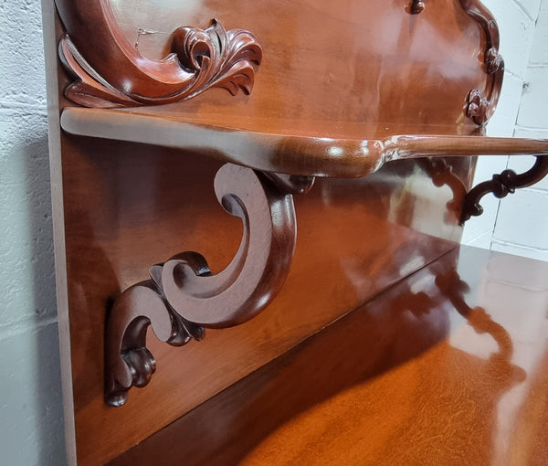 Beautiful Antique Victorian Mahogany two door Chiffonier. Plenty of storage space with one drawer and the two doors open up to a shelved area. It is in good restored condition.