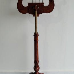 Elegant Mahogany and brass carved reproduction music stand excellent condition.