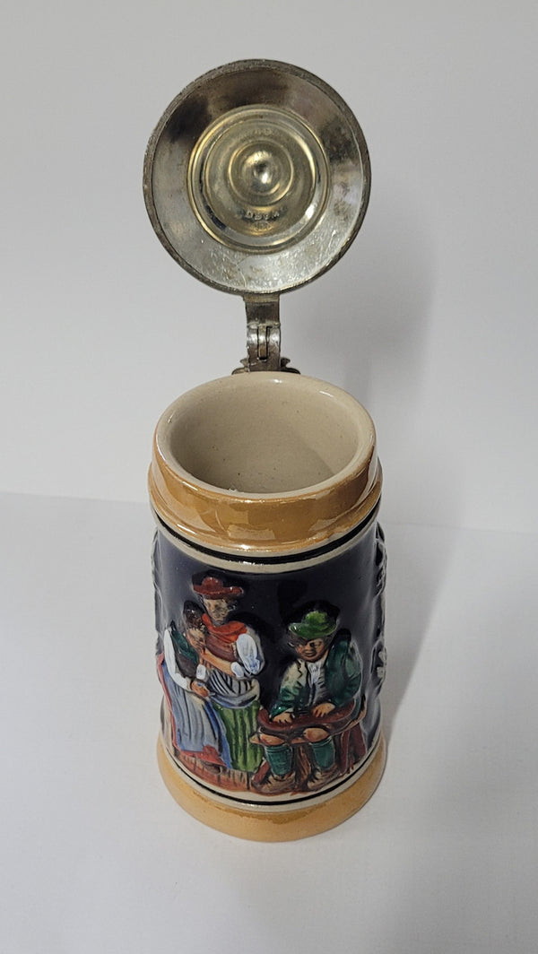 Small Vintage German beer stein marked made in the federal republic of Germany underneath. It is in good original condition, please view photos as they help form part of the description.