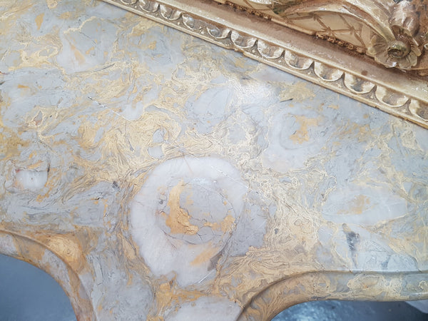 Beautifully carved Italian Rococo style painted console/hall table and mirror. An amazing coloured marble top showing sections of gold veins and is in good condition. Mantle mirror is retaining it's original mirror and showing ages spots.