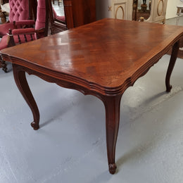 Beautiful French Oak Louis XV style parquetry top extension table. When fully extended the tables length is 239 cm. It is in good original detailed condition.