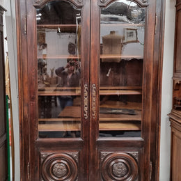 Substantial French Henry 2nd Walnut two door bookcase. It has five fully adjustable shelves and has been sourced from France. It is in good original detailed condition.
