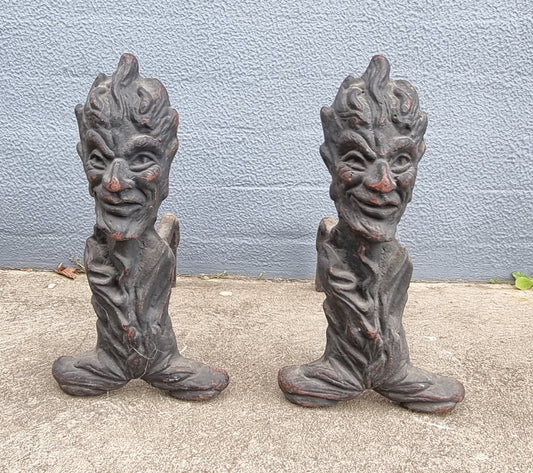 Fabulous rustic pair of French cast iron fire dogs. They are in good original condition.