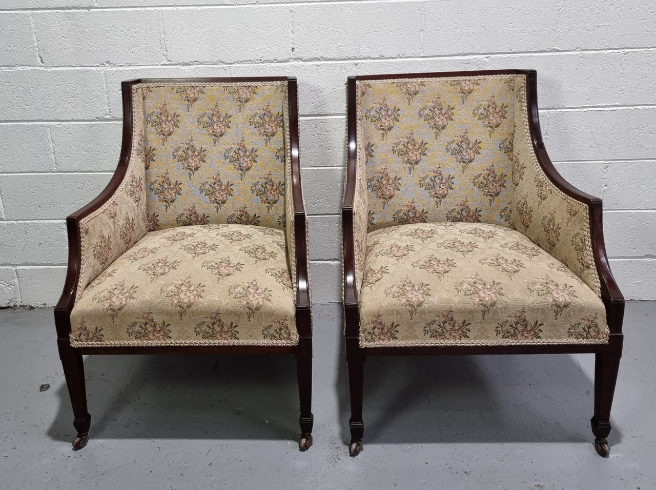 "A" Pair of Regency Style Wing Back Armchairs