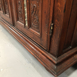A unique 18th century French oak carved cabinet with inset marble. In good original condition.
