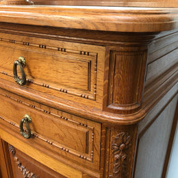 French Oak parquetry top sideboard with a glass top section for displaying and three cupboards and drawers for all your storage needs. Lovely carved details and is in good original detailed condition.