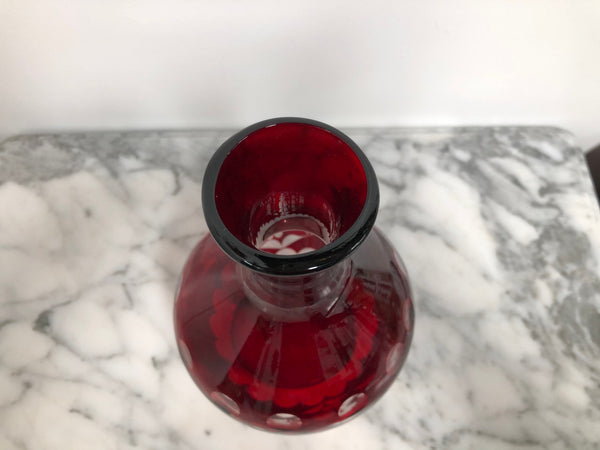 Vintage flash ruby glass water carafe with matching drinking glass.