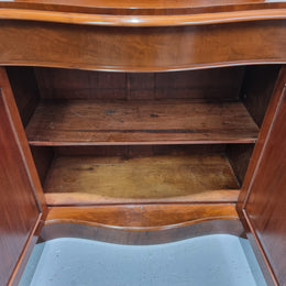 Beautiful Antique Victorian Mahogany two door Chiffonier. Plenty of storage space with one drawer and the two doors open up to a shelved area. It is in good restored condition.