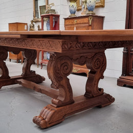 Amazing French Oak Renaissance style parquetry top extension table. Beautiful parquetry top and amazing detailed carvings on the legs. It extends to 306 cm long when fully extended. Sourced from France and in good original detailed condition.
