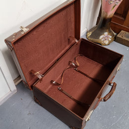 Impressive solid leather suitcase, moire fabric lined with leather straps to hold contents. Displays gold initials F.S.A near handle. With key. Please view photos as they help form part of the description.