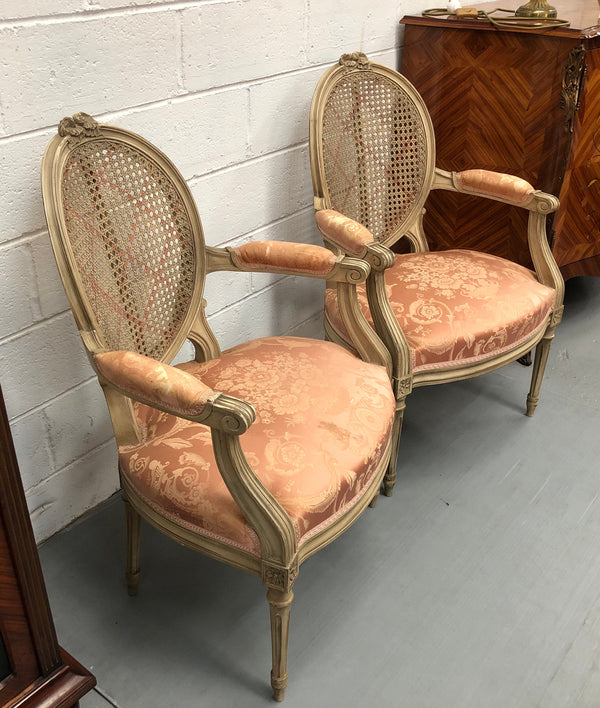 Pair Of French Louis XV Style Cane Back and Upholstered Seat Fauteuils