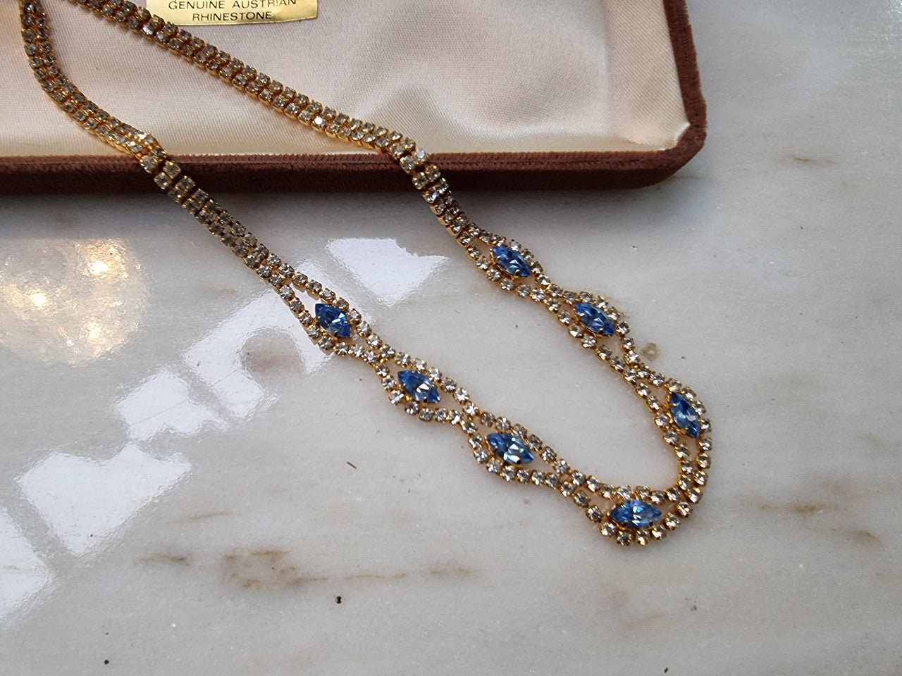 Beautiful vintage Austrian rhinestone necklace with lovely light blue stones and in good condition.