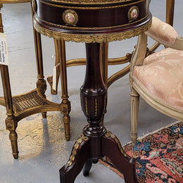 Elegant French louis XVI revival style round marble top side table with ceramic features and ormolu decoration. It is in good original detailed condition and has been sourced from France.