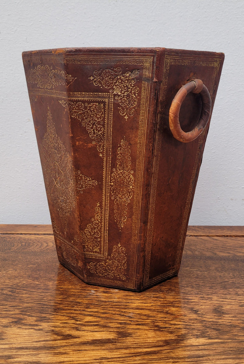 Vintage Italian tooled leather waste bin. It has been sourced locally and is in good original detailed condition. Please view photos as they help form part of the description.