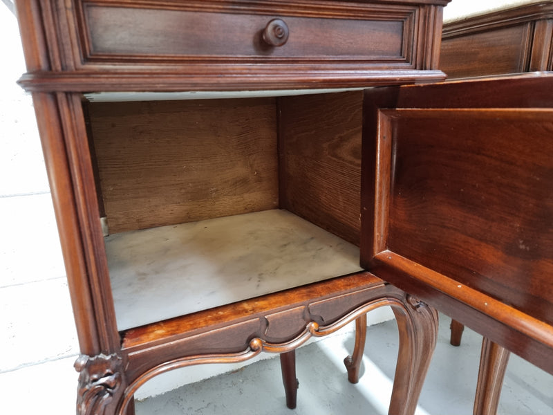 Pair of elegant Louis XV style marble top walnut bedside cabinets. One drawer and one cupboard. Circa 1900 in good original detailed condition.